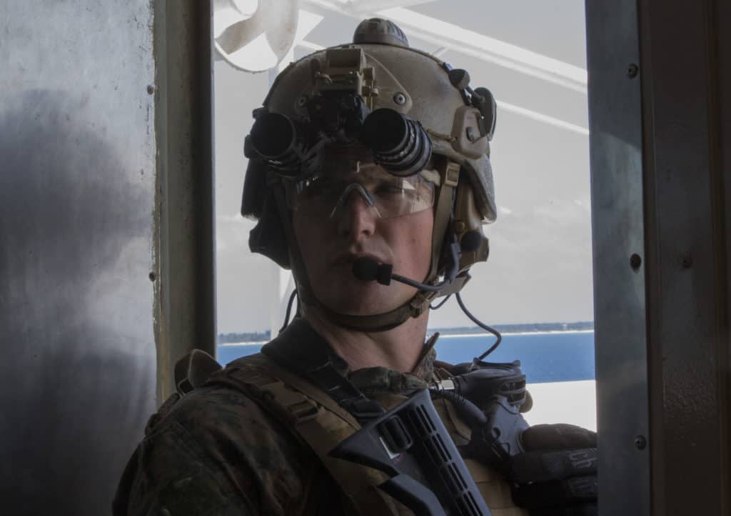 Marine with tactical helmet with IR strobe on top